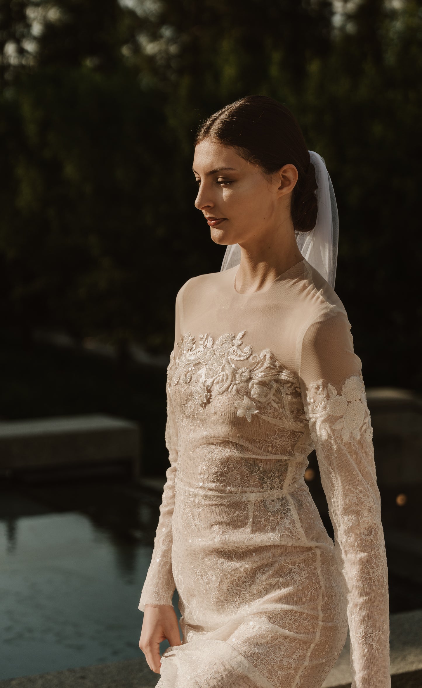 Custom bridal gown illusion neckline and beadwork detail