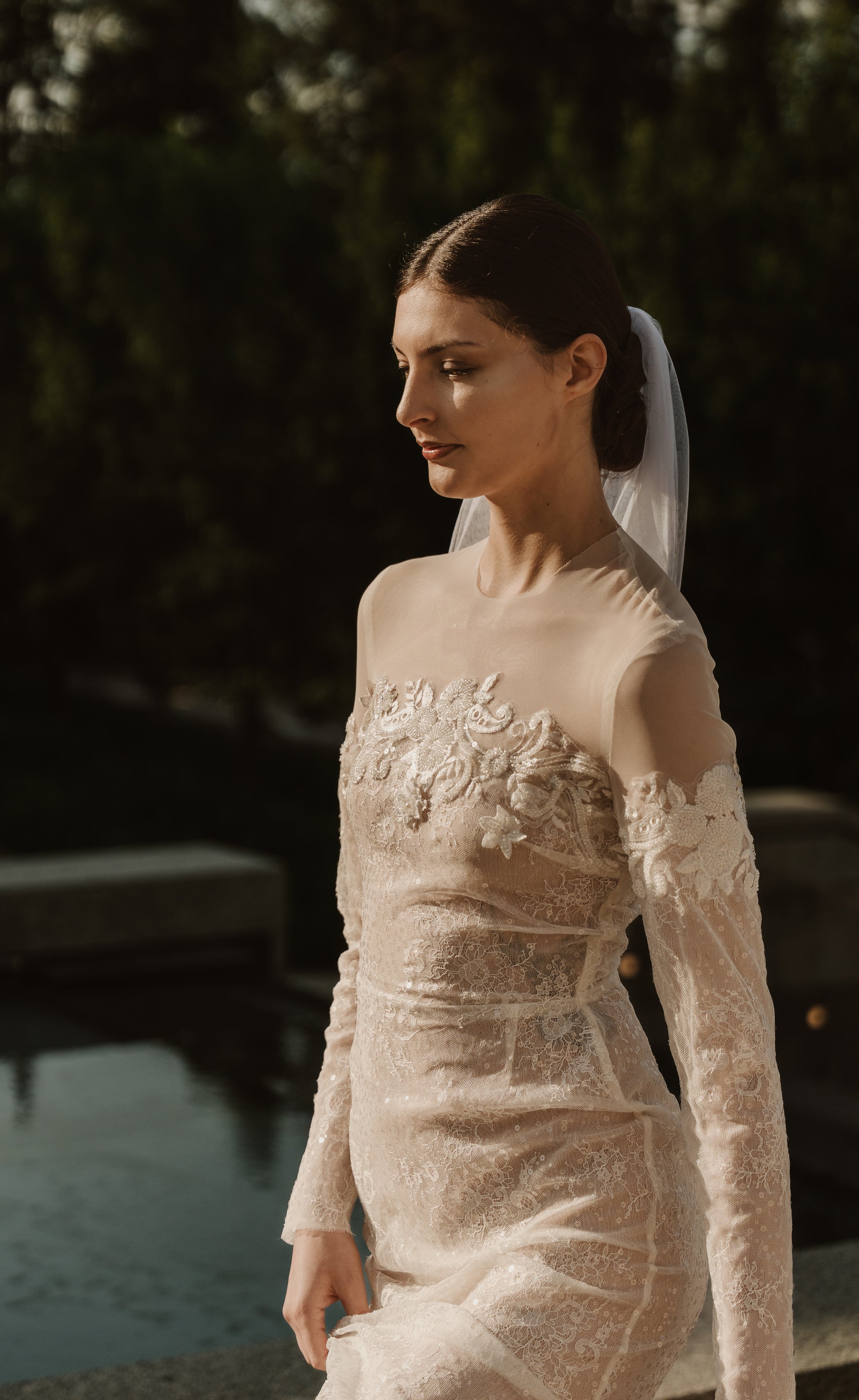 Custom bridal gown illusion neckline and beadwork detail